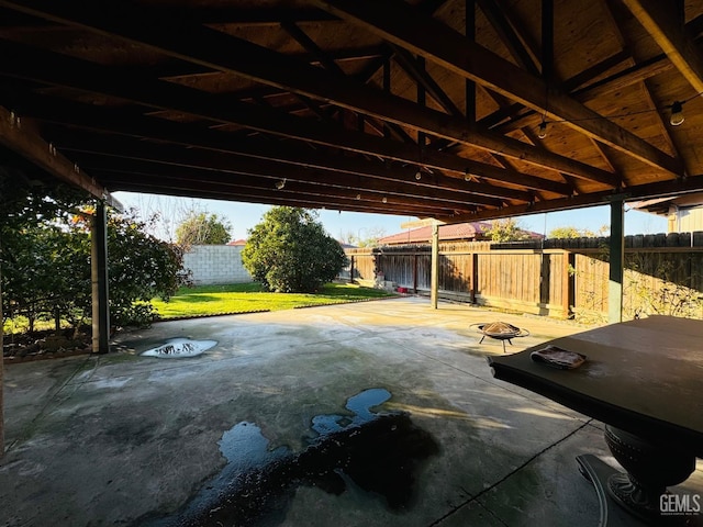 view of patio / terrace with an outdoor fire pit