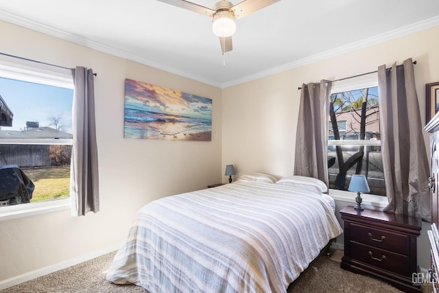 bedroom featuring ceiling fan, ornamental molding, and carpet