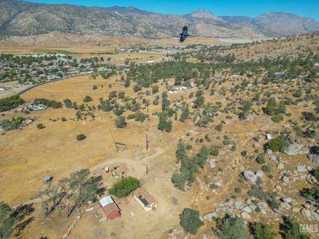 drone / aerial view featuring a mountain view