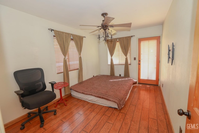 bedroom with ceiling fan and light wood-type flooring