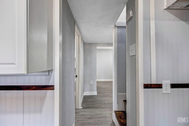 113 Lucard St, Taft, CA 93268 - corridor featuring wood finished floors and baseboards