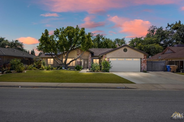 3105 Whisper Oak Way, Bakersfield, CA 93311 - ranch-style home featuring a garage, stucco siding, and driveway