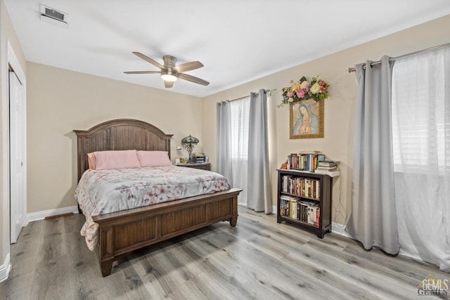 3105 Whisper Oak Way, Bakersfield, CA 93311 - bedroom featuring light wood finished floors, a ceiling fan, and baseboards