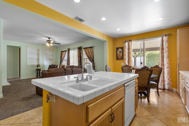 10114 Oporto Way, Bakersfield, CA 93306 - kitchen featuring a sink, light carpet, white dishwasher, tile countertops, and plenty of natural light