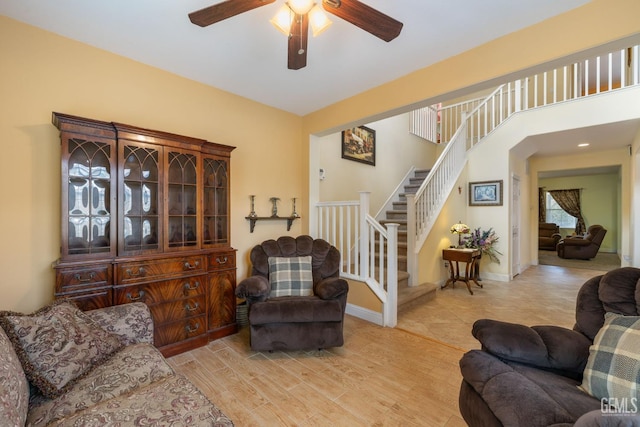 10114 Oporto Way, Bakersfield, CA 93306 - living area featuring a ceiling fan, stairway, and wood finished floors