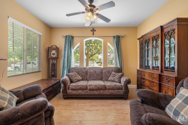 10114 Oporto Way, Bakersfield, CA 93306 - living room with light wood-style flooring and ceiling fan