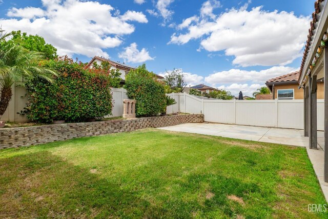 10114 Oporto Way, Bakersfield, CA 93306 - view of yard featuring a patio area