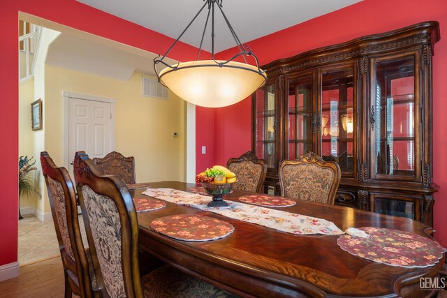 10114 Oporto Way, Bakersfield, CA 93306 - dining room with wood finished floors and baseboards