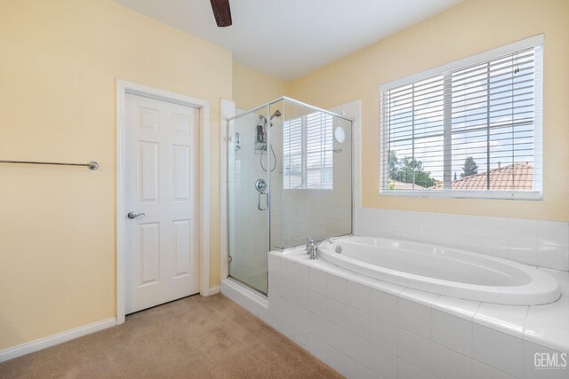 10114 Oporto Way, Bakersfield, CA 93306 - bathroom with a garden tub, a shower stall, and baseboards