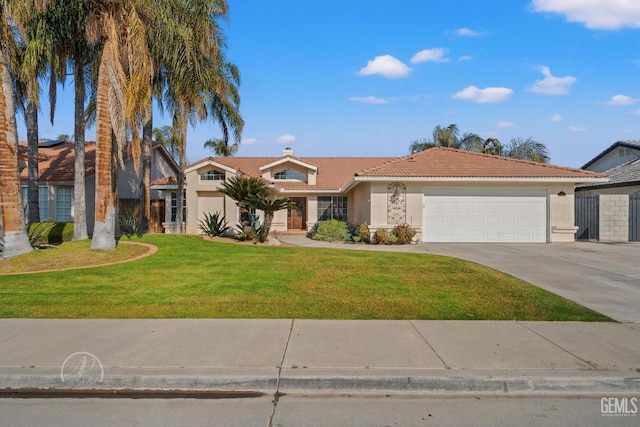 ranch-style house featuring a garage and a front lawn