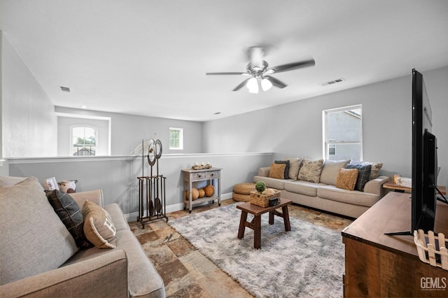 living room with ceiling fan