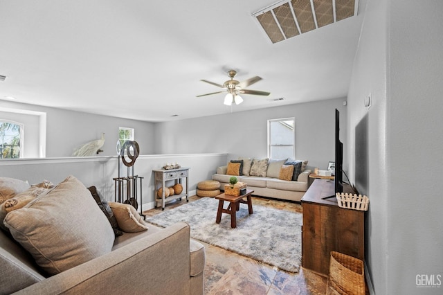 living room featuring ceiling fan