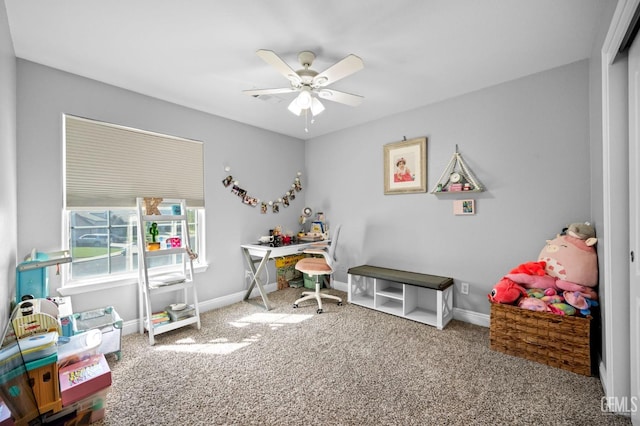 recreation room with ceiling fan and carpet floors