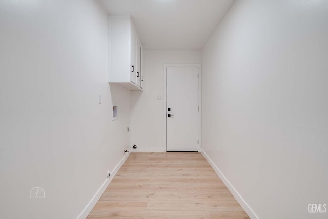 3700 Christmas Tree Ln, Bakersfield, CA 93306 - washroom with cabinet space, gas dryer hookup, hookup for a washing machine, light wood-type flooring, and electric dryer hookup