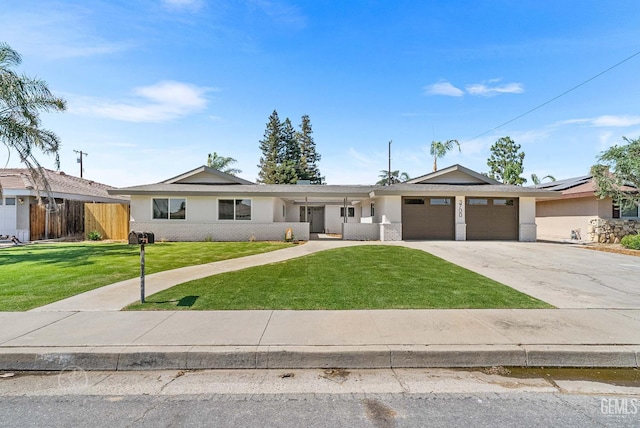3700 Christmas Tree Ln, Bakersfield, CA 93306 - ranch-style home featuring an attached garage, concrete driveway, stucco siding, and brick siding