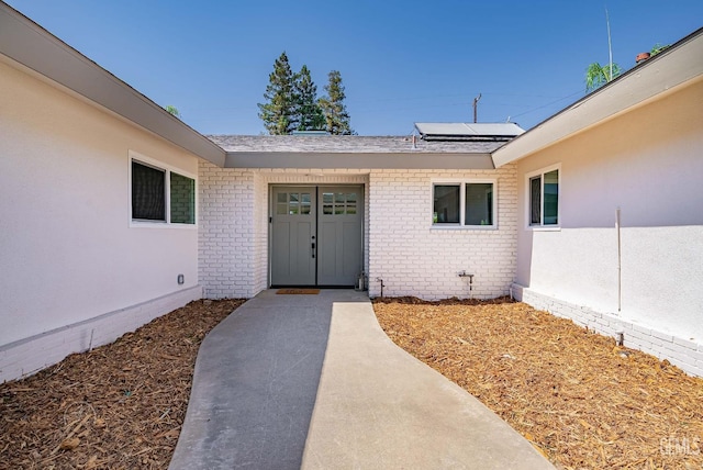 3700 Christmas Tree Ln, Bakersfield, CA 93306 - entrance to property with solar panels and brick siding