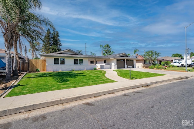 3700 Christmas Tree Ln, Bakersfield, CA 93306 - single story home featuring a garage, concrete driveway, and brick siding