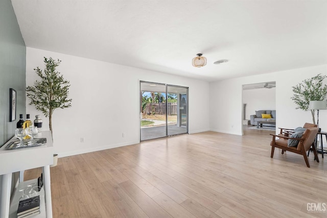 3700 Christmas Tree Ln, Bakersfield, CA 93306 - living area featuring light wood finished floors and ceiling fan