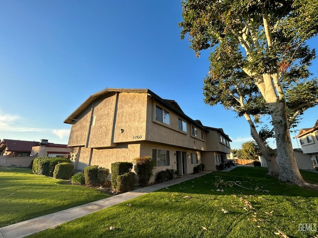 view of building exterior featuring fence