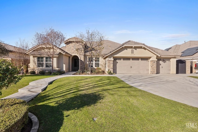 mediterranean / spanish-style house with a front lawn and a garage