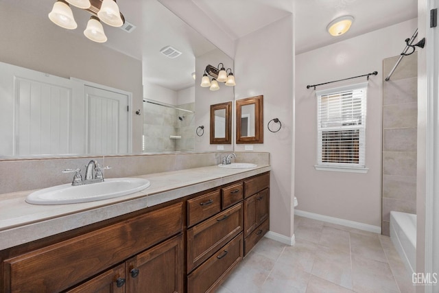 bathroom featuring toilet, tile patterned flooring, and vanity