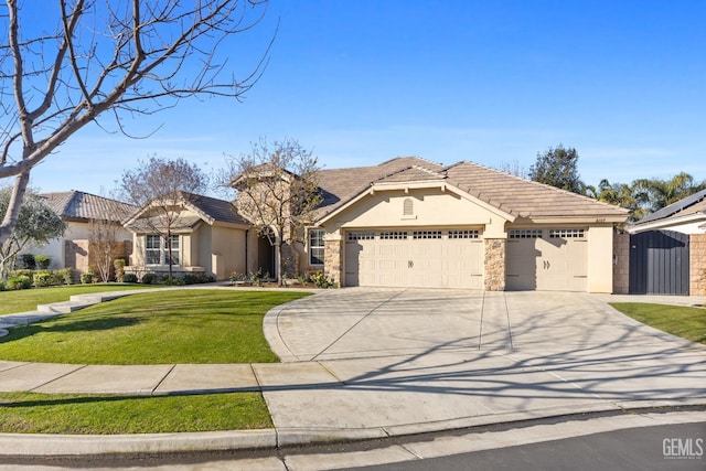 view of front facade featuring a garage and a front yard