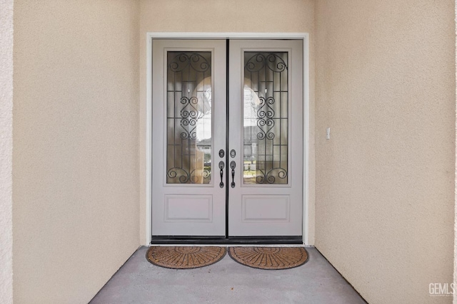 doorway to property with french doors