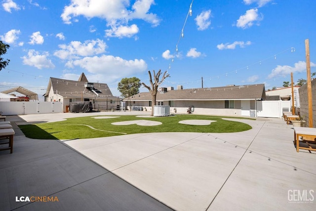 4620 Taft Hwy, Bakersfield, CA 93313 - back of property featuring a patio area, a fenced backyard, and a gate
