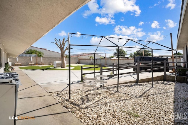 4620 Taft Hwy, Bakersfield, CA 93313 - fenced backyard featuring a patio area