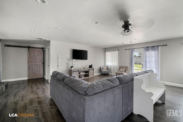 4620 Taft Hwy, Bakersfield, CA 93313 - living room with a barn door, dark wood-style flooring, and recessed lighting