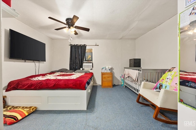 bedroom featuring a ceiling fan and carpet floors