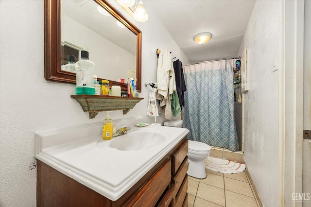 full bathroom featuring a shower with shower curtain, toilet, tile patterned flooring, and vanity