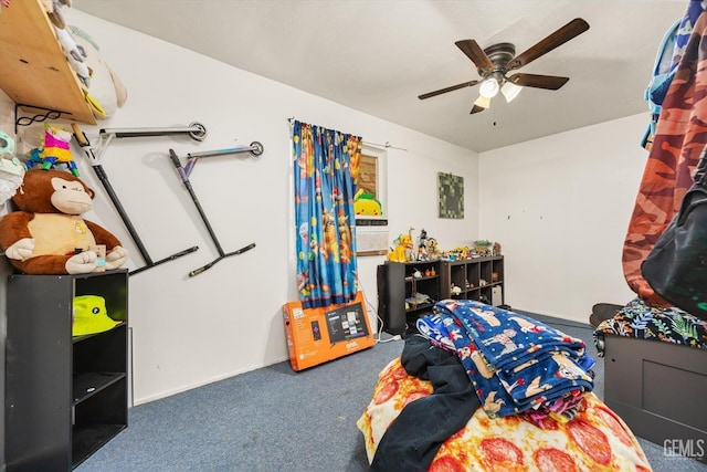 carpeted bedroom with a ceiling fan