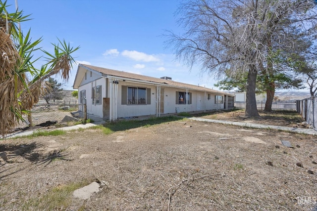 view of front of property with fence