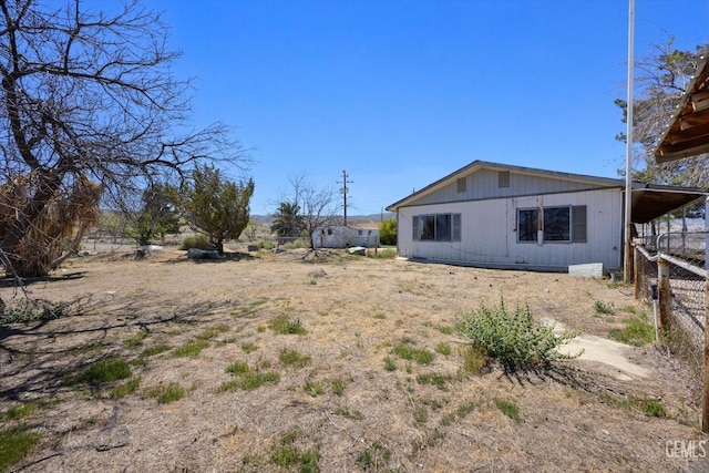 view of yard featuring fence