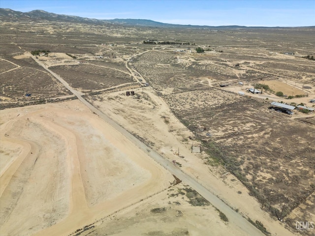 bird's eye view with a mountain view, a desert view, and a rural view