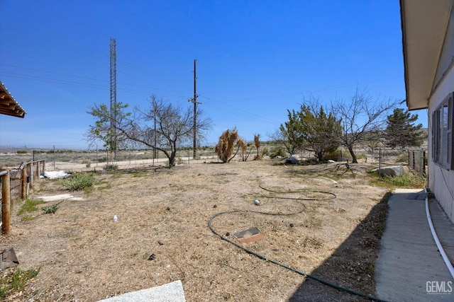 view of yard featuring fence
