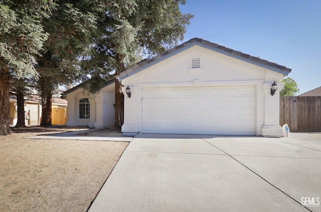 ranch-style home with a garage