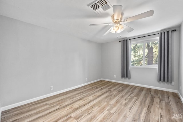 unfurnished room featuring ceiling fan and light hardwood / wood-style flooring