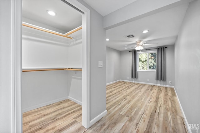 interior space featuring ceiling fan and light hardwood / wood-style floors