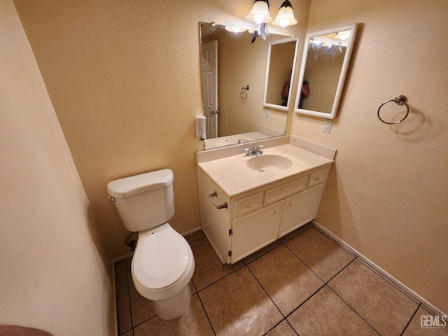5913 El Camino Ave, Bakersfield, CA 93313 - bathroom featuring toilet, tile patterned flooring, and vanity