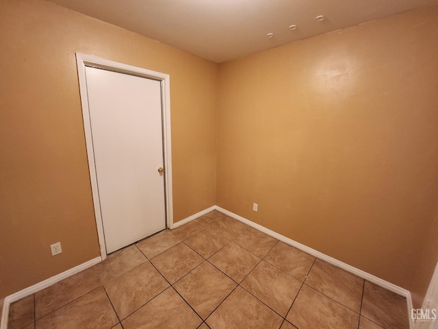 5913 El Camino Ave, Bakersfield, CA 93313 - spare room with light tile patterned floors and baseboards
