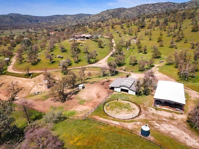 birds eye view of property with a mountain view