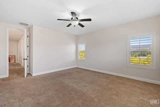14822 Plumeria Ct, Bakersfield, CA 93314 - unfurnished room featuring light colored carpet, ceiling fan, and baseboards