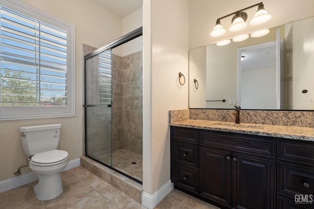 14822 Plumeria Ct, Bakersfield, CA 93314 - bathroom with baseboards, vanity, a stall shower, and tile patterned flooring