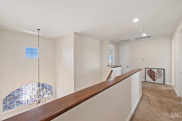 14822 Plumeria Ct, Bakersfield, CA 93314 - hallway with an upstairs landing, light colored carpet, a chandelier, baseboards, and recessed lighting