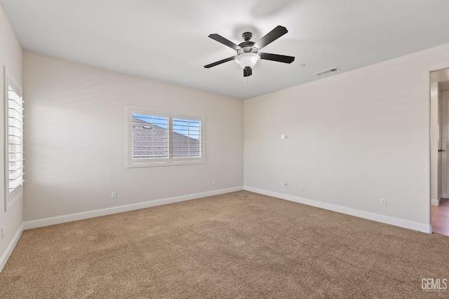 14822 Plumeria Ct, Bakersfield, CA 93314 - carpeted spare room with healthy amount of natural light, a ceiling fan, and baseboards