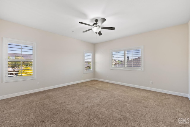 14822 Plumeria Ct, Bakersfield, CA 93314 - empty room featuring ceiling fan, carpet, and baseboards