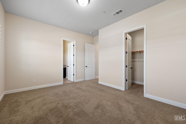 14822 Plumeria Ct, Bakersfield, CA 93314 - unfurnished bedroom with carpet flooring, baseboards, a spacious closet, and a closet