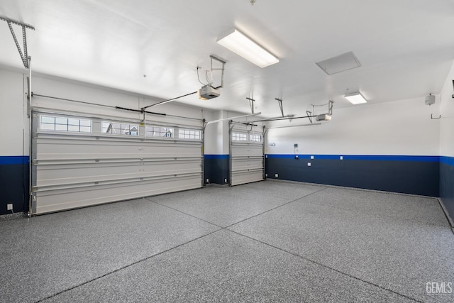 14822 Plumeria Ct, Bakersfield, CA 93314 - garage with a garage door opener and baseboards